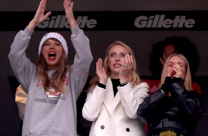 Taylor Swift 'splashed out $1,200 on five vintage Chiefs sweatshirts from a Kansas City store' as owner reveals popstar's appearance at Travis Kelce's games have led to unprecedented sales