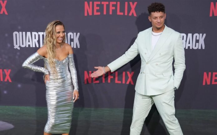 Patrick Mahomes and Travis Kelce Wear Matching Pastel Suits for ‘Quarterback’ Premiere: ‘Wish It Was Planned’