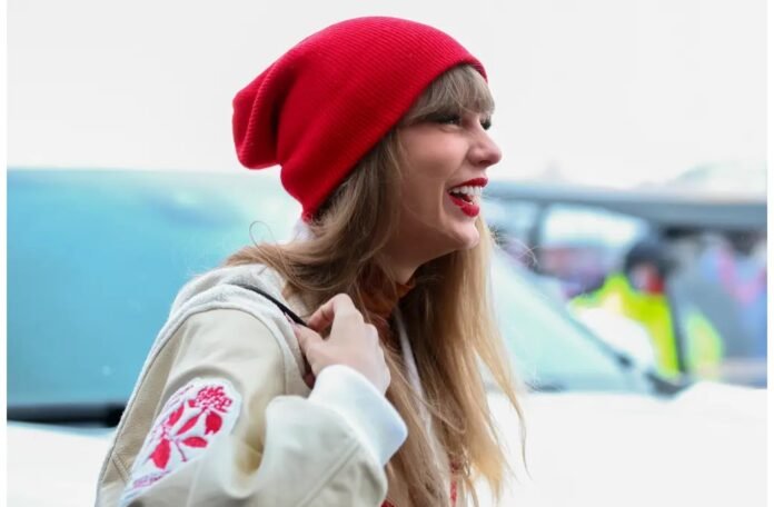 Taylor Swift bundles up in Chiefs colors at Buffalo Bills playoff game