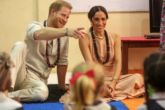 Meghan Markle Has Proud Wife Moment with Prince Harry in Nigeria "You're the best husband in the world"